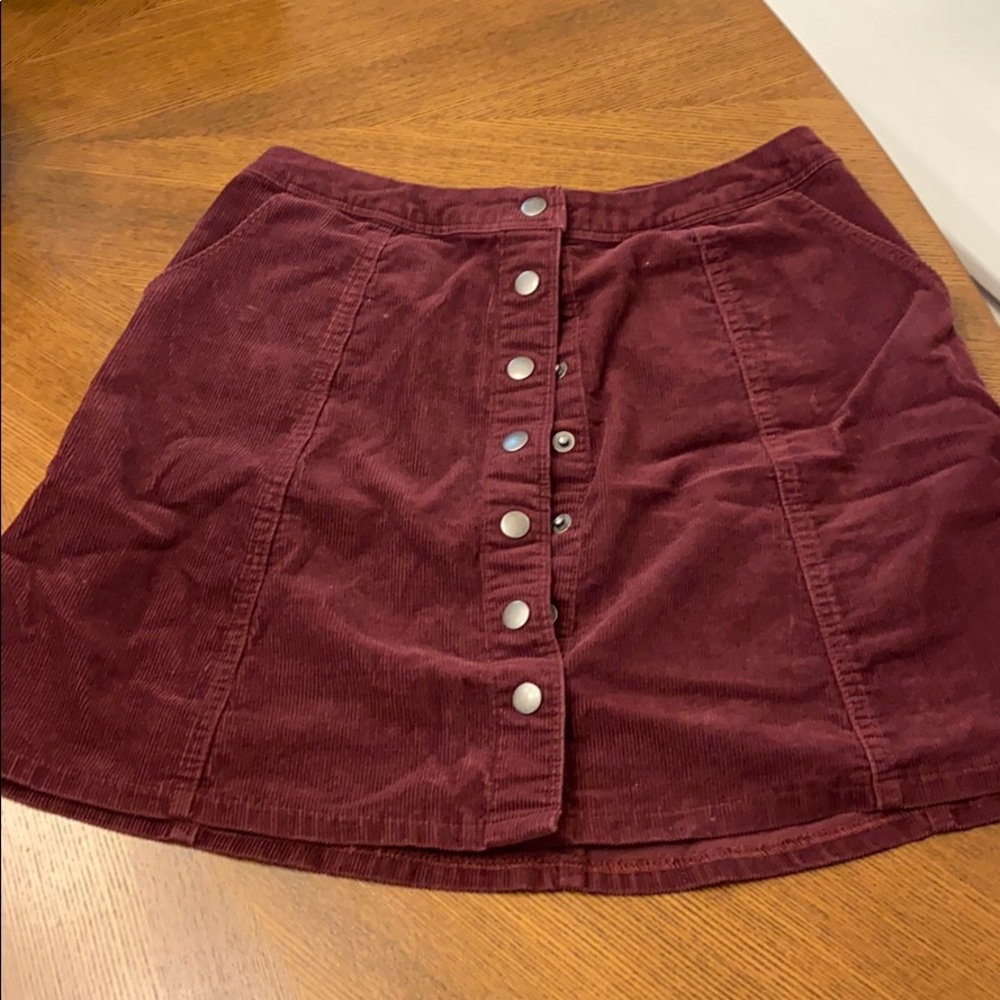 Corduroy plum color skirt with buttons